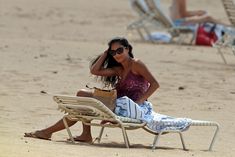 Соблазнительная Николь Шерзингер загорает на пляже в Гонолулу фото #7