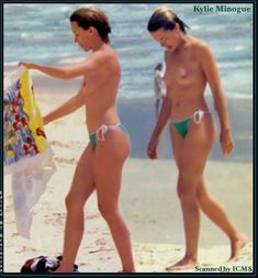 Сексуальная Кайли Миноуг топлесс на пляже фото #1
